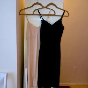 Two Calypso microfiber slip dresses.